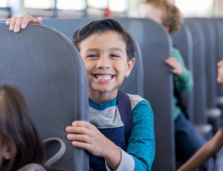 Boy on a schoolbus